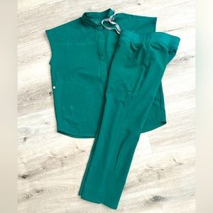 Figs scrub set Rafaela top and pants. Small stain on the pants, see photo.